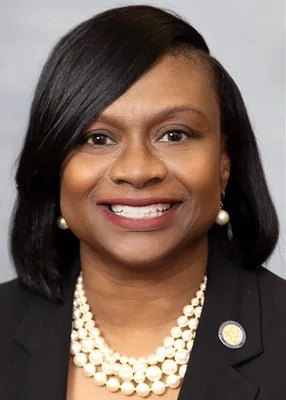 Official portrait of Monika Johnson-Hostler