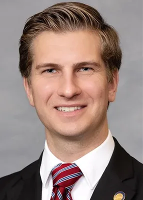 Official portrait of Jake Johnson