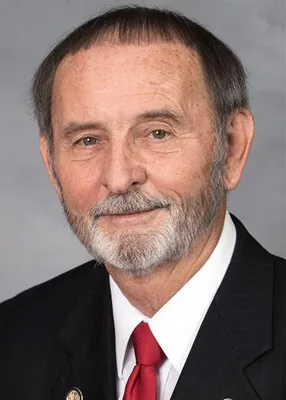 Official portrait of Larry Potts