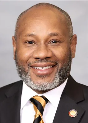 Official portrait of Amos Quick