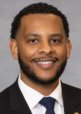 Official portrait of Caleb Theodros