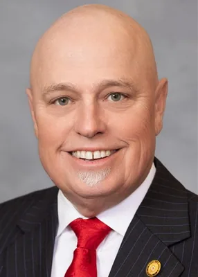 Official portrait of Eddie Settle
