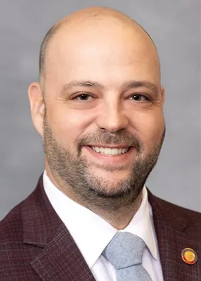 Official portrait of Bryan Cohn