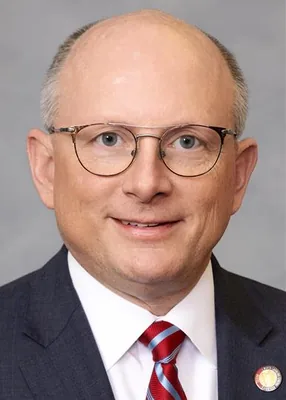 Official portrait of Tim Reeder